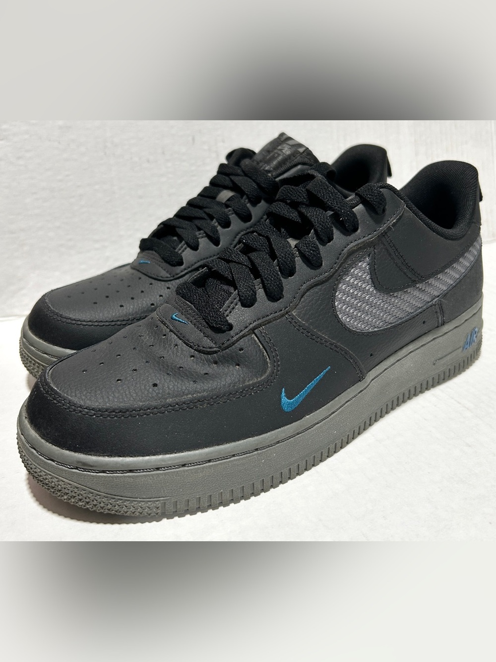 Nike Air Force 1 Black and Blue Low-Top Sneakers